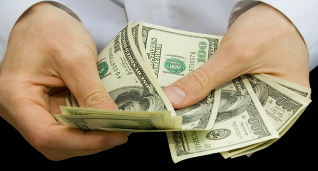 american dollars in the hands
