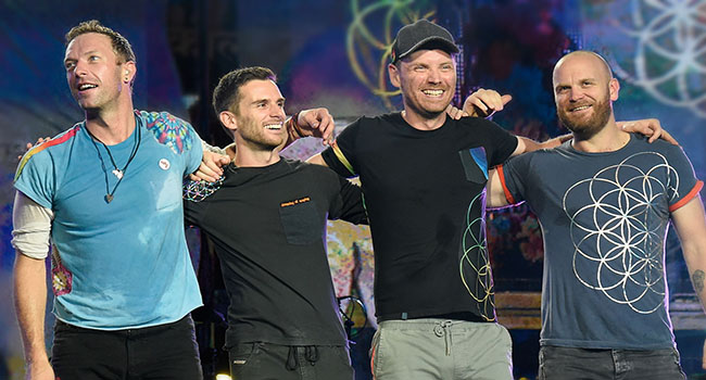 PHILADELPHIA, PA - SEPTEMBER 04: (L-R) Chris Martin, Guy Berryman, Jonny Buckland, and Will Champion of Coldplay take a bow after performing during the 2016 Budweiser Made in America Festival at Benjamin Franklin Parkway on September 4, 2016 in Philadelphia, Pennsylvania. (Photo by Kevin Mazur/Getty Images for Anheuser-Busch)