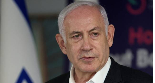 Israeli Prime Minister Benjamin Netanyahu speaks during a press conference at the Sheba Tel-HaShomer Medical Centre, in Ramat Gan on June 8, 2024 amid the ongoing conflict in the Palestinian territory between Israel and the militant group Hamas. Israel said its forces rescued four hostages alive from a Gaza refugee camp on June 8 as it intensified an assault despite scrutiny over a deadly strike on a UN-run school there. The four had been kidnapped by Hamas from the Nova music festival during the October 7 attacks that sparked the war, the army said. JACK GUEZ/Pool via REUTERS