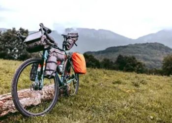 Travelers packed mountain bike with no people