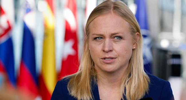 Finland's Foreign Minister Elina Valtonen talks to journalists as she arrives to a meeting of NATO foreign ministers at NATO headquarters in Brussels, Tuesday, Nov. 28, 2023. NATO foreign ministers on Tuesday begin a two-day meeting in which the alliance will reaffirm its support for Ukraine's defense against Russia's invasion, explore ways of easing tensions between Kosovo and Serbia and look at preparations for NATO's 75th anniversary next year. (AP Photo/Geert Vanden Wijngaert)