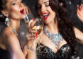 Happy Laughing Women Drinking Champagne and Singing Xmas Song