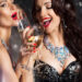 Happy Laughing Women Drinking Champagne and Singing Xmas Song